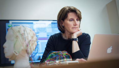 Researcher Lara Boyd analyzes data on her laptop at the Djavad Mowafaghian Centre for Brain Health